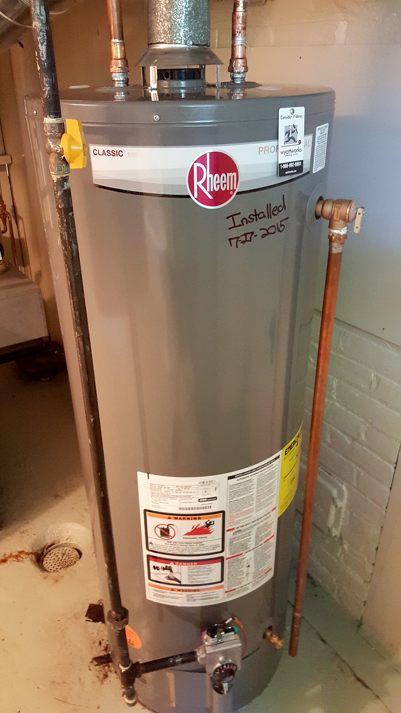 A newly installed tank water heater in a home